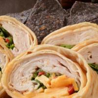Turkey And  Pepper Jack Wrap · Sliced turkey, pepper jack cheese, and baby spinach on a wrap.