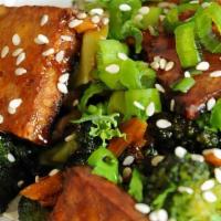Vegan Teriyaki Tofu With Broccoli Rice Bowl · Cilantro Rice, teriyaki tofu, sauteed broccoli with sesame and soy sauce.