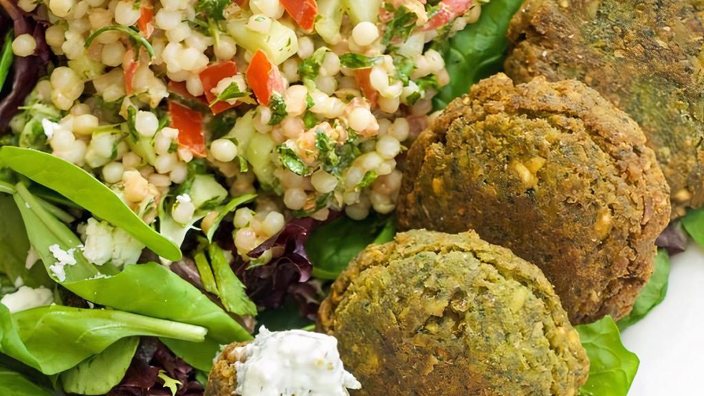 Falafel &  Hummus In A Cup · Spinach, falafel fritters, hummus for a great healthy snack