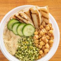 Detox Moroccan-Spiced Chickpea Glow Bowl · perfect blend of protein and flavor, spiced chick peas with spices, chopped cucumbers, cousc...