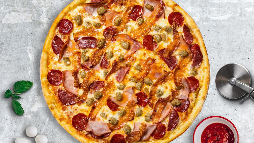 Meat Monster Pizza · Mozzarella, pepperoni, chicken, and sausage baked on a hand-tossed dough