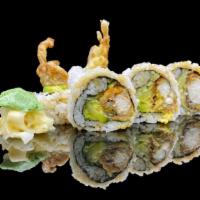 Spider Roll · Deep-fried soft shell crab, cucumber, and avocado wrapped inside out with tobiko and sesame.