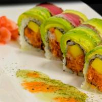 Dynamite Roll · Spicy tuna and mango wrapped inside out. Topped with pepper tuna, avocado, and wasabi sauce.