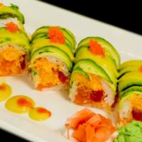 Central Park Roll · Tuna, salmon, spicy lobster salad inside, topped with avocado, tobiko, and mango sauce.