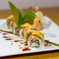 Hawaii Roll · Shrimp tempura and eel inside, topped with crabstick, avocado and spicy mayo.