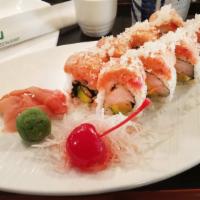 Sunset Roll · Spicy yellowtail and avocado inside, topped with spicy tuna and crunch.