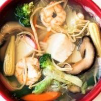 Seafood Soup · Clear broth with shrimp, scallops, and mixed vegetables.
