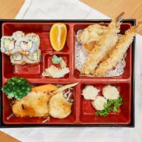 Bento Box D  (Salmon) · Salmon teriyaki, shrimp and vegetable tempura, shrimp shumai, and California roll.