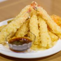Shrimp Tempura Dinner · Shrimp and vegetables. Served with miso soup, white rice, and house salad,deep-fried tempura...