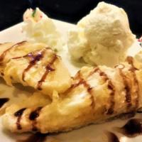 Banana Tempura · Fried banana with one scoop of ice cream.