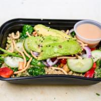 Chickpea Buddha Bowl · Warm Quinoa, Chickpeas, Spinach, Bell Peppers, Cucumber, Avocado, Red Onion, and Crispy Nood...