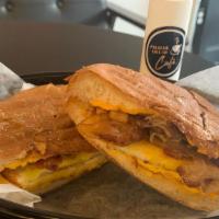 Bacon Egg & Cheese · Bacon, eggs and american melted cheese, on a kayser roll