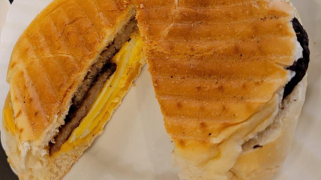 Sausage, Egg & Cheese · a sausage pattie with melted american cheese, egg on a ciabatta bread
