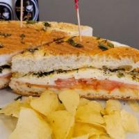Caprese Sandwich · Fresh Mozzarella Cheese, Tomato, Basil Leaves, Basil Oil, On Ciabatta Bread.   comes with ch...