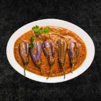 Smoked Eggplant Masala (Vegan) · Spit fire roasted eggplant slow cooked to with ginger, garlic, onions, green chilies, finish...