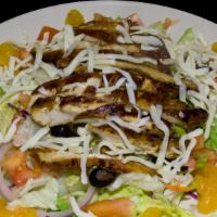Marinated Chicken Salad · Mixed greens with our Marinated Chicken Breast, Tomatoes, Mandarin oranges, black olives, su...