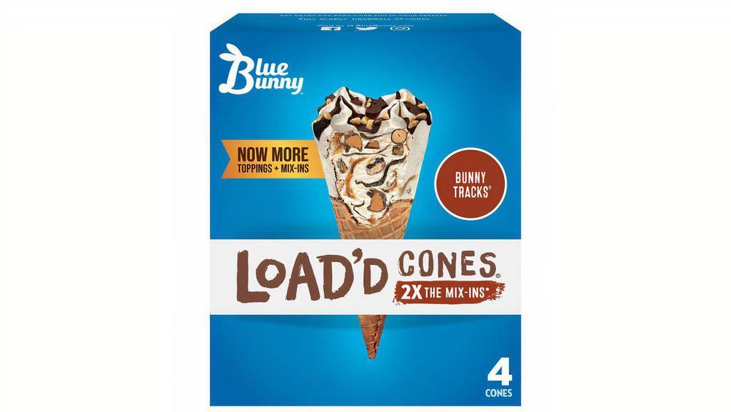 Bunny Tracks Load'D Cones · Vanilla frozen dairy dessert with fudge and caramel swirls, peanut butter filled bunnies topped with chocolaty topping and peanut halves in a sugar cone.