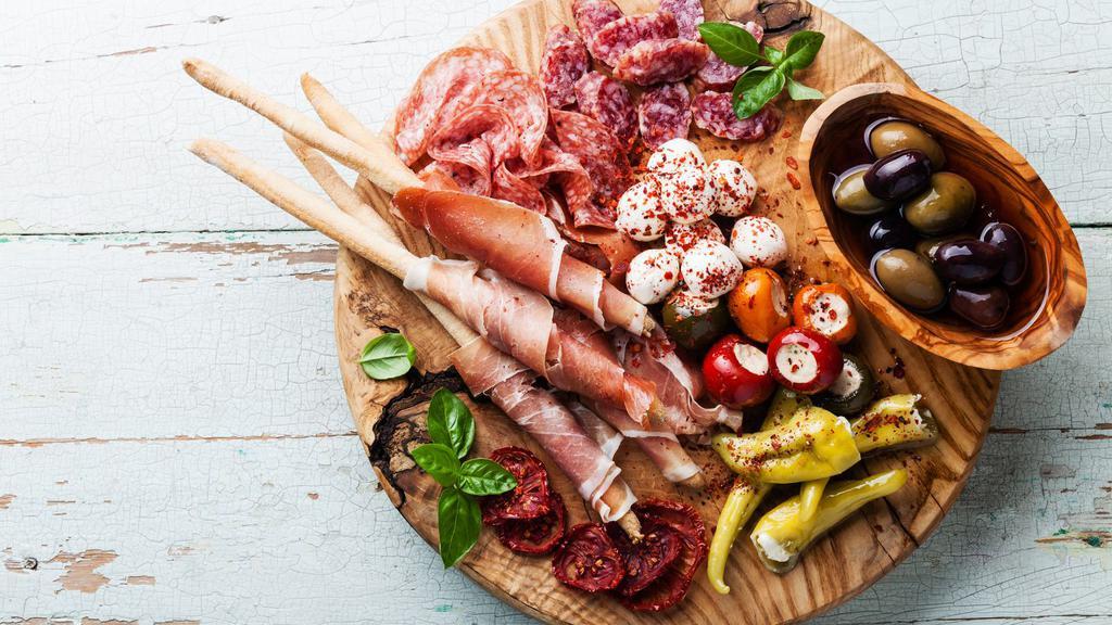Cold Antipasto · Cold Italian appetizer with meat and vegetables.