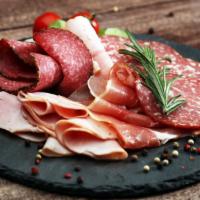 Hot Antipasto · Hot Italian appetizer with meat and vegetables.