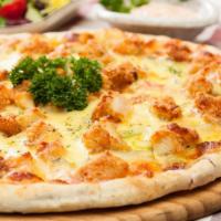 Chicken Parmigiana Pizza · Crispy marinated chicken topped with house specials and cheese.