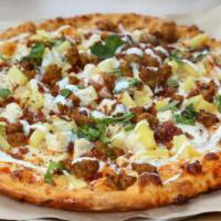 Buffalo Chicken Pizza · Delicious and tangy buffalo marinated chicken topped with house specials and cheese.