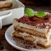 Tiramisu · Classic Italian dish featuring espresso-soaked ladyfingers with a layer of mascarpone and a ...