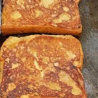 French Toast · Dip slices of bread in a mixture of beaten eggs, milk, cinnamon and vanilla. and a coffee