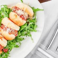 Polpette Sliders · Veal meatballs stuffed with fontina topped with marinara