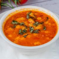 Pasta Fagioli (L) · Pasta and bean soup, light tomato broth with garlic and parmigiano-reggiano