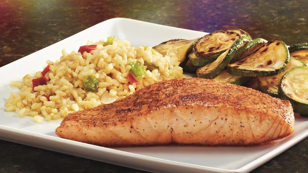 Grilled Salmon · Lightly seasoned salmon grilled to perfection. Served with your choice of two sides.
