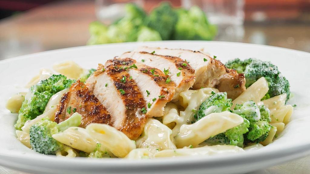 Chicken & Broccoli Pasta · Seasoned chicken and fresh broccoli over penne pasta in Parmesan cream. Served with 4 Breadsticks.