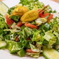 Chopped Salad · Vegetarian, vegan, gluten free. Persian cucumber, romaine, tomatoes, scallions, lemon, evoo.