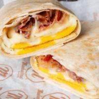 Breakfast Omelet Wrap · Omelet made with three eggs, American cheese, and your choice of meat.