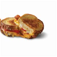 Grilled Cheese · With bacon and tomato on multigrain bread
Served with pickle and chips