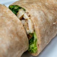 Grilled Chicken Caesar Wrap · Grilled chicken breast, Asiago cheese, lettuce, caesar dressing, and tomatoes. Served with p...