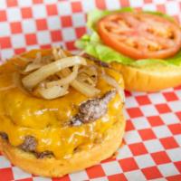 Cheeseburger · 1/3 lb 100% local grass fed beef patty. comes with lettuce tomato & sautéed onions.