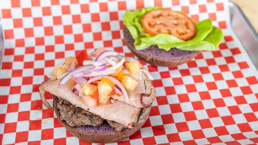 Hawaiian Brian Burger · Teriyaki burger with black forest ham, grilled pineapple salsa.