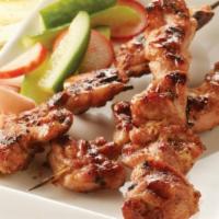 Yakitori · Skewered chunks of chicken in chef special sauce.