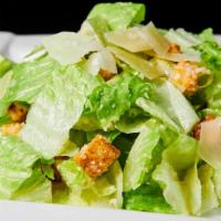 Caesar Salad  · Garlic Croutons, Shaved Parmesan Cheese, Caesar Dressing.