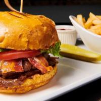 The Cecil Angus Burger  · Lettuce, Tomato, Caramelized onions, yellow or White Cheddar, pickles, French Fries.