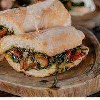 Vegetarian Panini · Grilled Panini Sandwich made on a European Flatbread, and topped with Mozzarella cheese, spi...