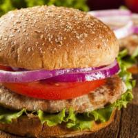 Turkey Burger · Juicy, grilled turkey patty with Swiss cheese, fresh lettuce, tomatoes and onions with pickl...