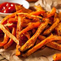 Sweet Potato Fries · Golden, crispy hand cut sweet potatoes, fried to perfection.