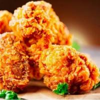 Chicken Wings · 6 pieces of chicken wings breaded and fried to perfection.