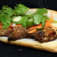 Ga Nuong Xa Sandwich · Grilled lemongrass chicken.
Served with mayo, cucumbers, cilantro, jalapenos, pickled carrot...