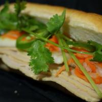 Cha Lua Sandwich · Vietnamese pork roll, pate.
Served with mayo, cucumbers, cilantro, jalapenos, pickled carrot...