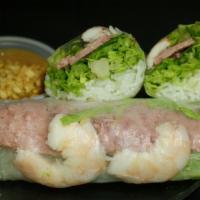 Saigon Special Summer Rolls · 2 rolls. Shrimp and bbq pork patty combination.
Contain rice noodles, lettuce, and basil and...