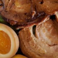 Shoyu Ramen   · Chicken broth, braised chasu, boiled egg, woodear mushrooms, naruto, black garlic truffle oi...