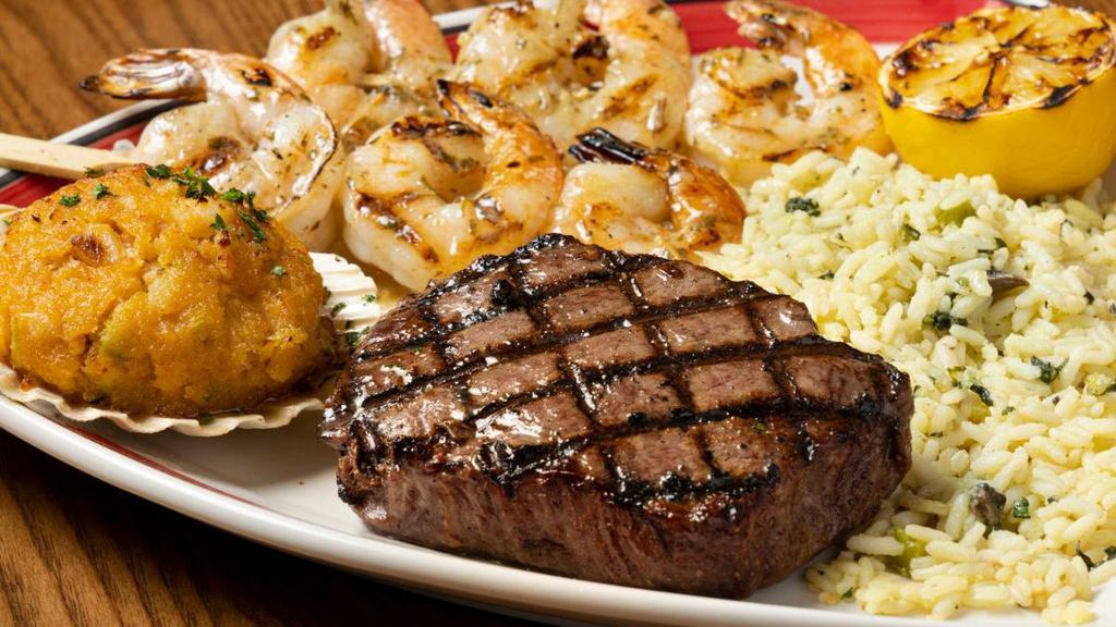 3-Way Sirloin* & Grilled Shrimp Skewers Combo With Seafood Stuffie · A tender and juicy 8 oz. Top Sirloin flame broiled to your taste paired with delicious shrimp seasoned and grilled to perfection. Served with a Seafood Stuffie and one side.