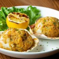 Seafood Stuffies · A New England favorite with a twist. Plenty of scallops, shrimp and delicious spices stuffed...